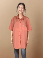 Elegant Peach-Colored Short-Sleeve Shirt